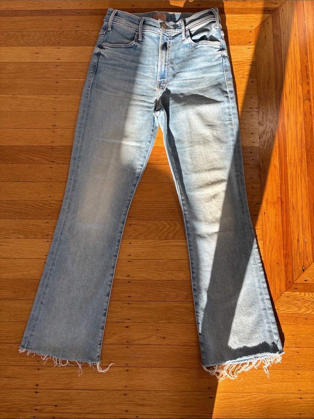 MOTHER Light Wash Raw Hem Flare Jeans